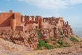 Red rocks and decorated old houses, the ancient walls of Kawkaban, Yemen